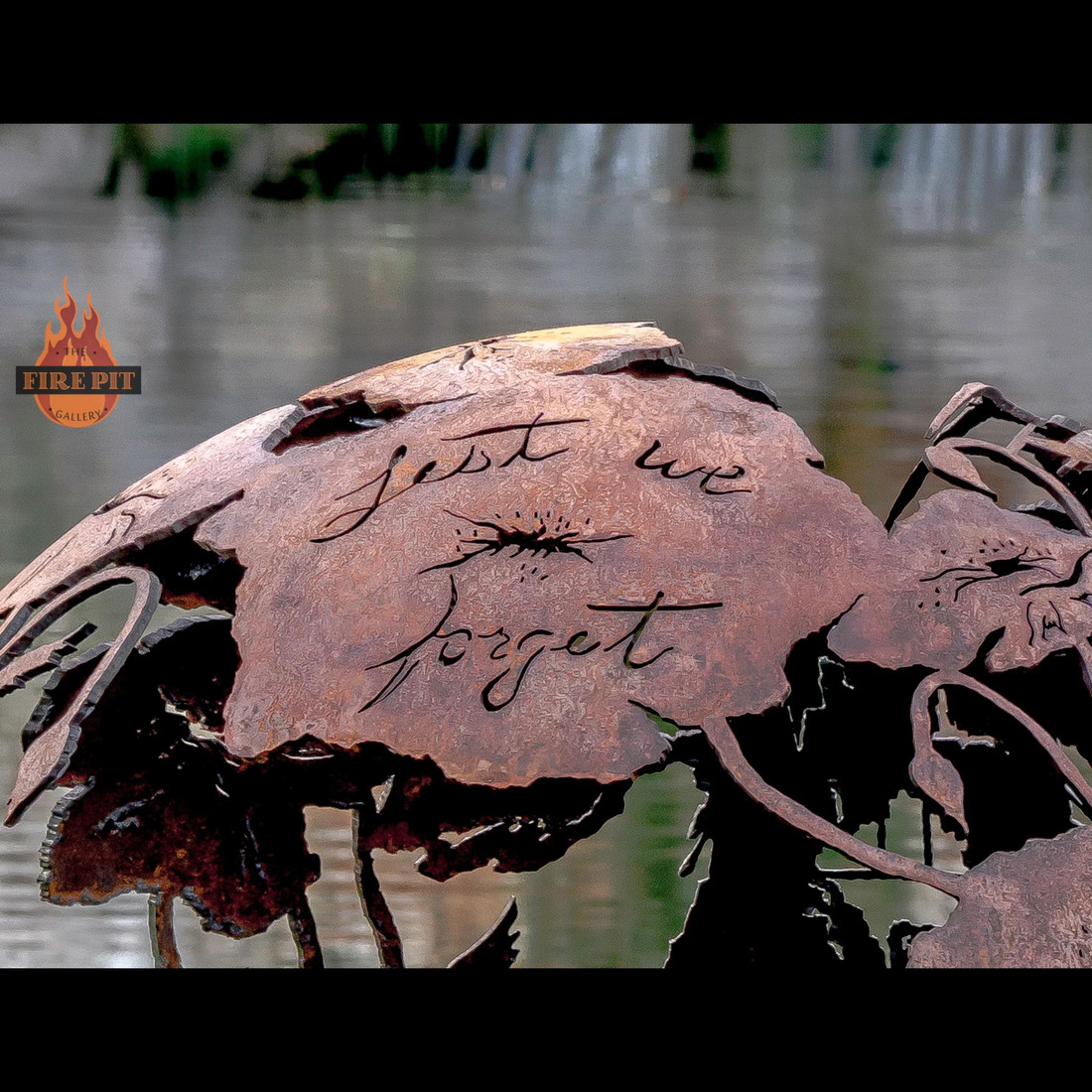 The Fire Pit Gallery 37 Inch Lest We Forget Remembrance Day Sphere Fire Pit with Flat Steel Base