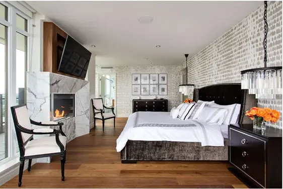 Reasons To Reconsider Hanging A TV Over A Fireplace