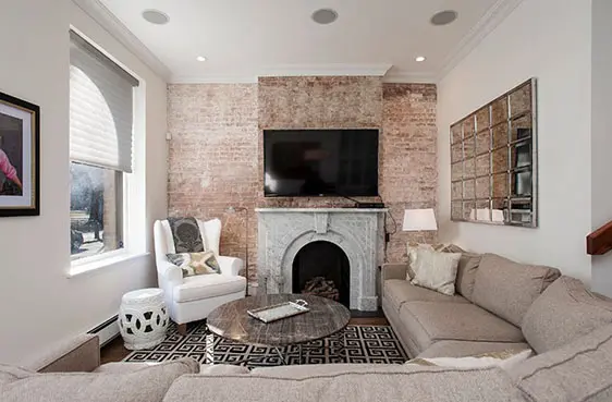 Reasons To Reconsider Hanging A TV Over A Fireplace