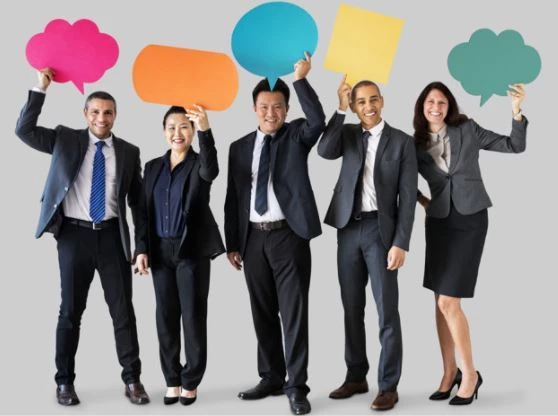 Business people holding word bubbles