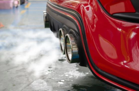 Exhaust gases from a red car