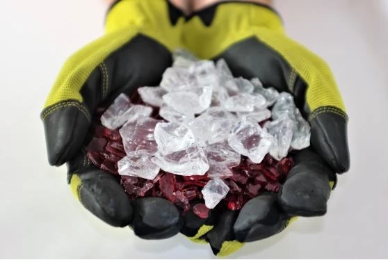 Handful of reflective fire glass media