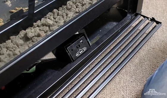Gas fireplace remote receiver battery compartment