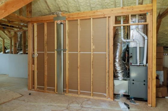 Installing a wood furnace beside existing HVAC